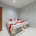 RedDoorz Twin Room Pelajar Pejuang 3
